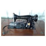 Singer Sewing machine in cabinet with Stool Seat,