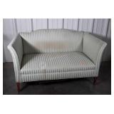 Loveseat formal Style solid made but fabric is in