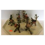 Group of bird figurines. One has some damage on