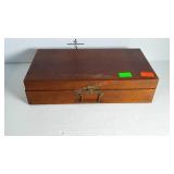 An old wooden silverware box