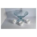 Three white glass pieces and a stemmed blue glass