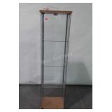 Lighted glass curio cabinet with glass shelves,
