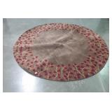 Brown leaf design circle rug 71" in diameter