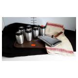 Spice canisters, linen towel, crumb tray