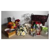 Candles, candle holders, basket, plastic fruit,