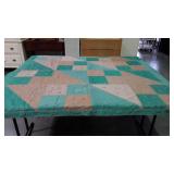 Vintage hand stitched, knotted quilt in very nice