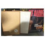 Two cork boards and a die harder poster