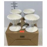 Four sundae cups with writing utensil and four