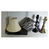 A cable box, two lamps and lampshades