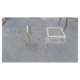 Outdoor lot, end table missing glass, and