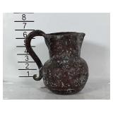 Small primitive looking metal pitcher with great