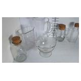 A Collection of glass items- 2 Pitchers, 3 jars