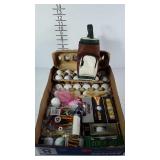 Golf supplies, balls in a variety of brands, tees