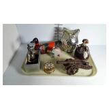 Glass owl,  iron cannon, a bell, wooden duck,