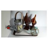 Props including water can two shells on bases and