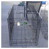 Large metal dog crate, does have bend in bottom,