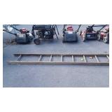 Wooden ladder, nine feet long, does have damage