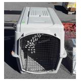 Large poly dog crate, does show dog has chewed on