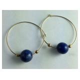 Pair of hoop earrings with blue stone