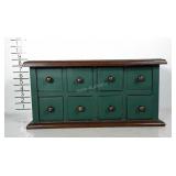 Replica wooden spice cabinet.
