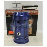 Two camping lanterns with fans