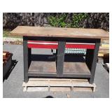 Work bench, five feet long, does have damage on