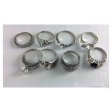 Seven CZ rings- 6 are Sterling one is plated