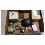 Flat with lighters one is zippo, cross necklace,