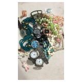 Costume jewelry with some watches and pocket