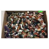 Flat of several beaded stone necklaces