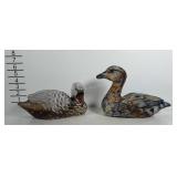 Older wooden decoys. One swan and one duck.