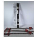 Three metal clamps and a 2