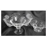 Two decorative glass bowls with bubbled effect