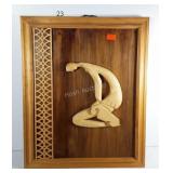 Wood art, raise carved kneeling figure