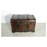 Decorative storage trunk. Stands 13" high.