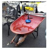 Metal wheelbarrow, auger, loppers