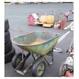 Green metal wheelbarrow by Craftsman missing one
