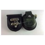 Two pocket watch holders