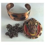 Copper bear paw bracelet and a necklace