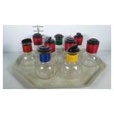 Hot water bottles, nine, some are Jeanette Glass