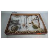 Small flat of costume jewelry