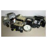 Office supplies. Adding machines, phones, clock,