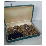 Small jewelry box full of costume jewelry