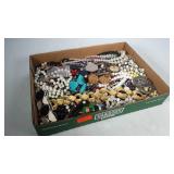 Small flat of costume jewelry