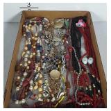 Small flat of costume jewelry