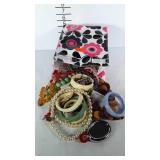 Vinyl lunch bag filled with costume jewelry