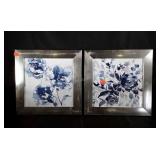 Matching blue floral pics in metallic frames.