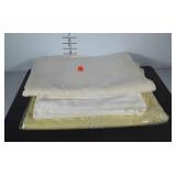Table linens, three tablecloths including a light