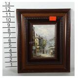 Textured painting on board of town scene.  Solid