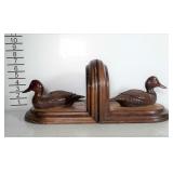 Solid wood decoy bookends.